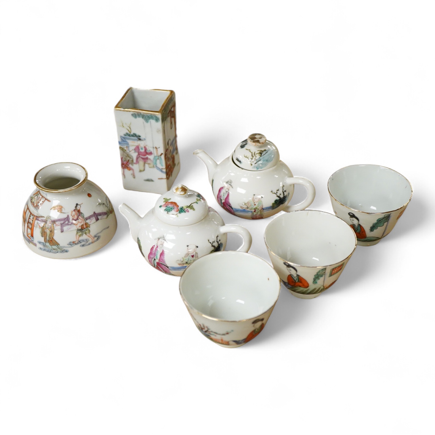 A collection of late 19th century Chinese famille wares to include a water pot, two teapots, and a square brushpot, together three Republic period tea bowls, largest 9cm high